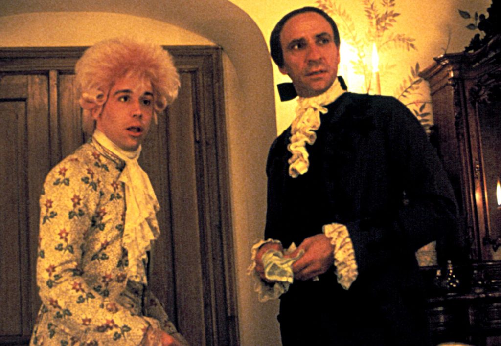 Mozart (Tom Hulce) e Salieri (F. Murray Abraham) in una scena di «Amadeus», film di Forman del 1984 (Keystone)