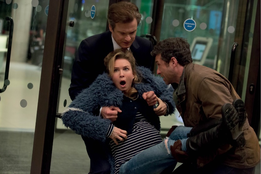 Bridget Jones incinta viene aiutata dai suoi due uomini (interpretati da Firth e Dempsey). (Keystone)