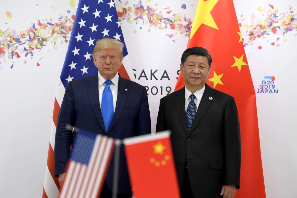 Trump (sulla sinistra, vicino a Xi Jinping) in campagna elettorale ha evocato addirittura tasse doganali del 60% (Keystone)