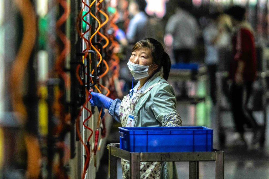 Una fabbrica di tecnologia di precisione nella provincia del Guangdong, Cina Sudorientale, dove si producono componenti per cellulari, tablet e computer (Keystone)